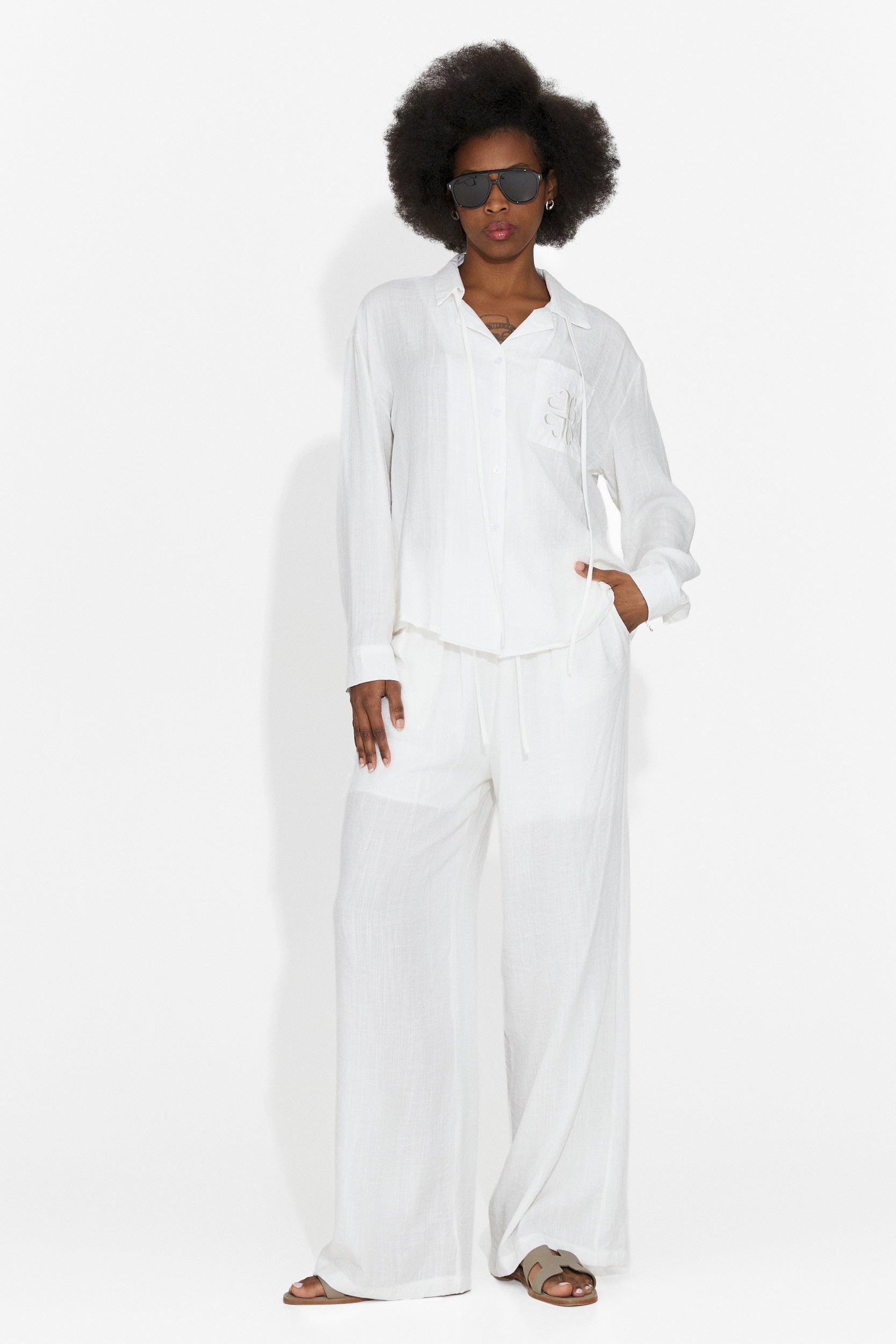 Aralia Bogas Women's Suit with White Trousers