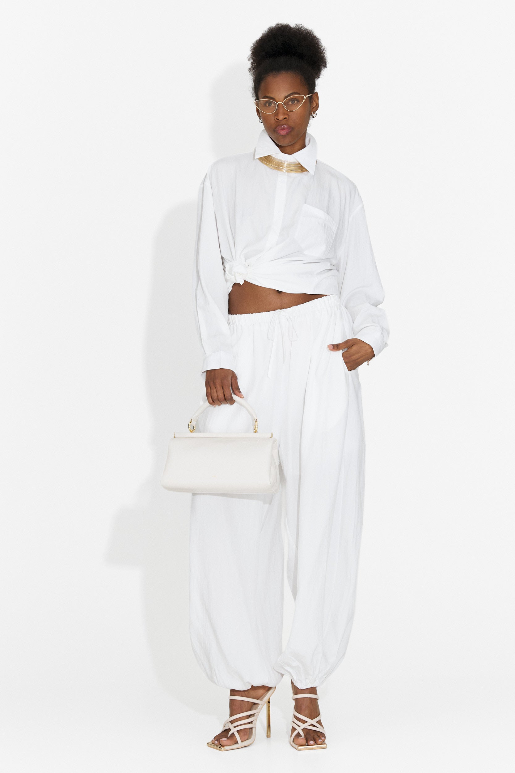 Kadea Bogas Women's Suit with White Trousers